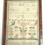 See previous photo/description; one of two samplers or other side of sampler bag by Barbara Hickmott, probably English 19th century, possibly Maine origin