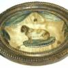Exceptional oval miniature in pressed brass frame - Spaniel on a pillow.  circa 1800 Anglo-American